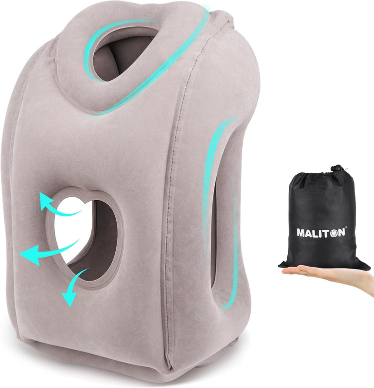 Grey TravelKit cervical travel pillow with ergonomic 45° support for neck comfort during trips.